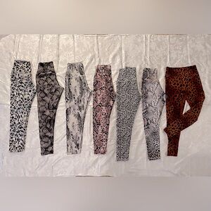 7 pair of animal print Creative Evloution leggings 
All size small